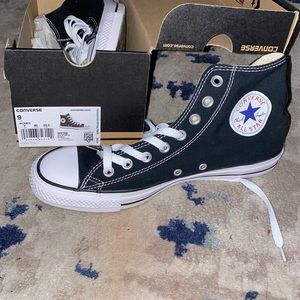 Brand-new black high top Converse sneakers